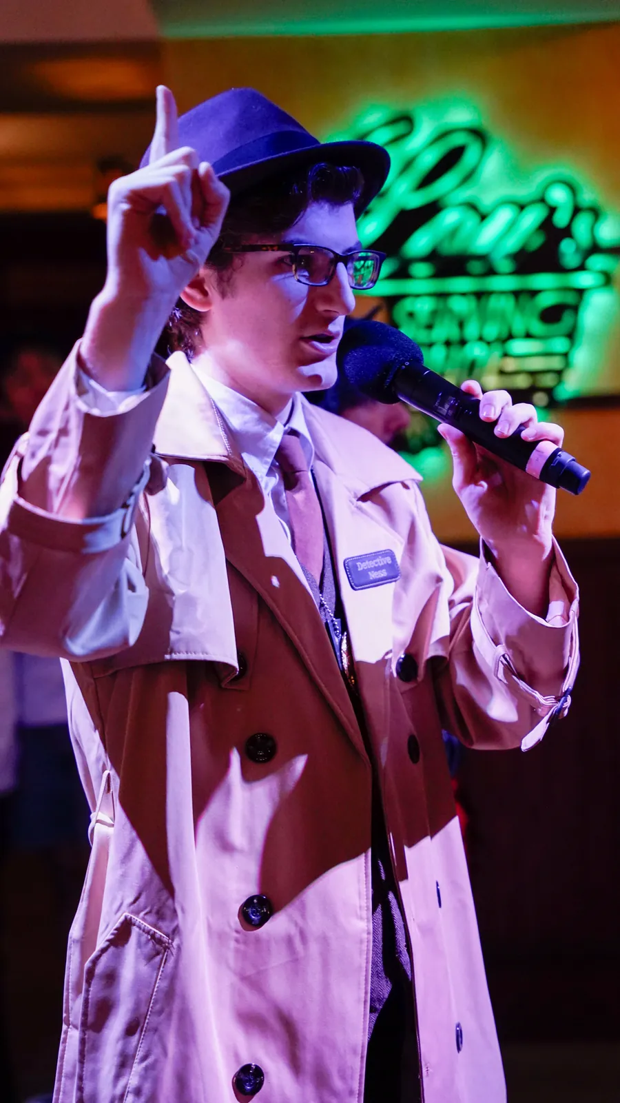 A Murder Mystery Company actor working the room at a Miami show