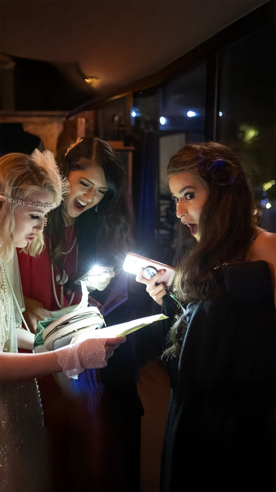 Guests at a Murder Mystery Company public dinner show in Miami